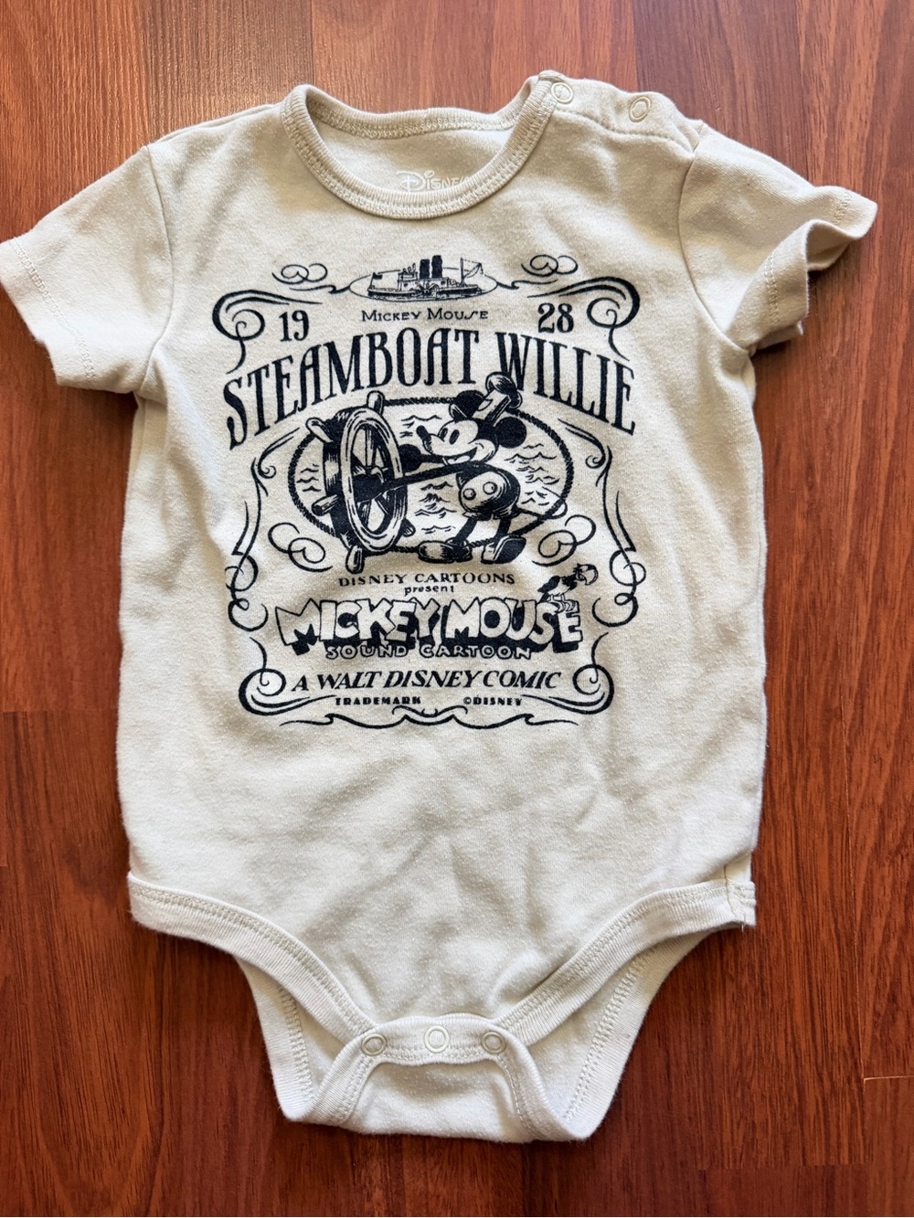 Classic Steamboat Willie graphic onesie
